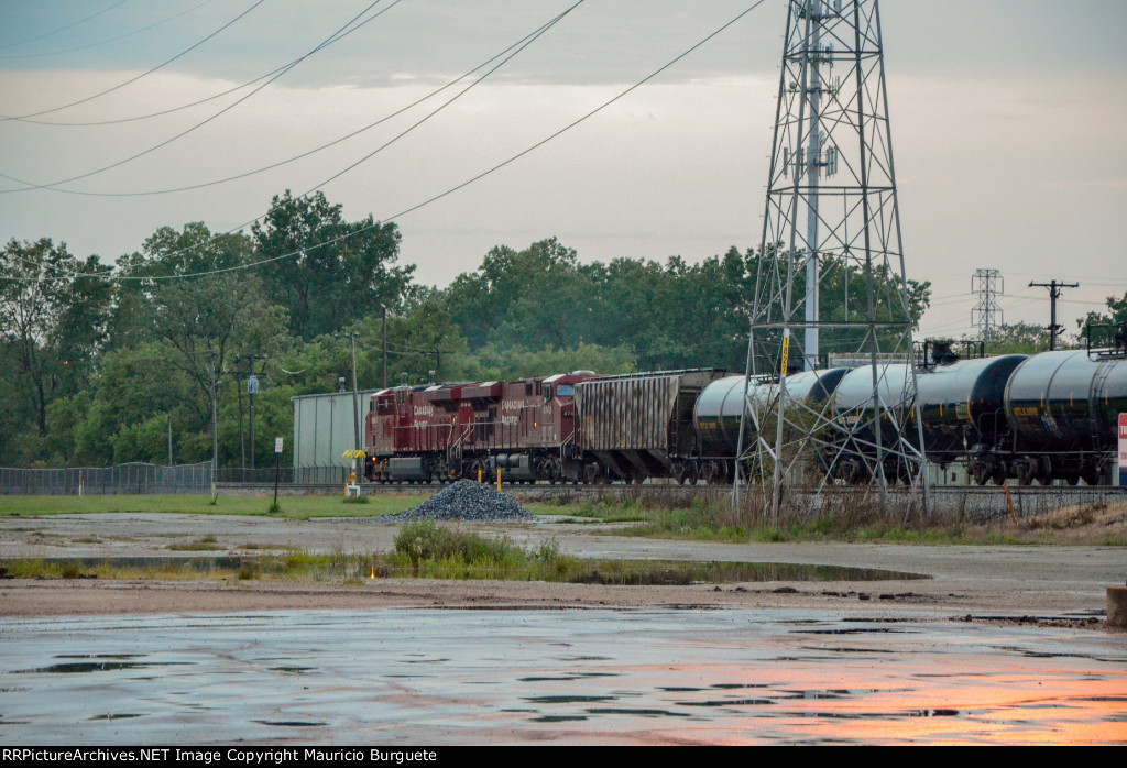 CP ES44AC Locomotives leading a train